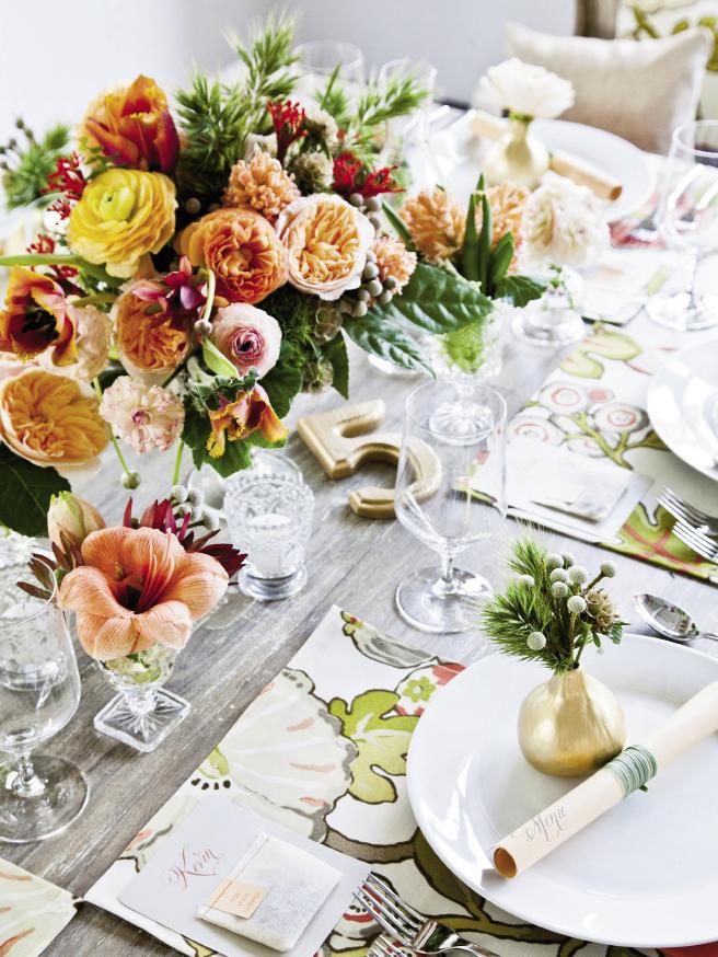 SET UP: the team fell for a swatch of peach and coral fabric (“Hip Floral Sorbet” from Calico Corners) that inspired the color palette. They sewed place mats, pillows, and Chiavari chair covers in the material, and picked a floral menu to repeat its colors for fresh, organic style.