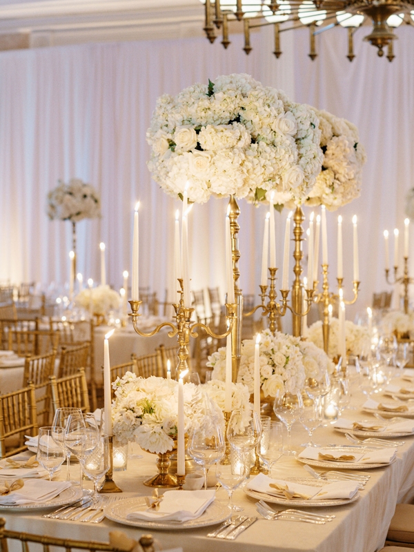 With a ceremony at Cathedral of St. John the Baptist, cocktails at Mills House, and a reception at Hibernian Hall, Daniel Trexler and Paige Marshall’s wedding was a true Charleston affair; they envisioned an opulent yet elegant gold and white reception.