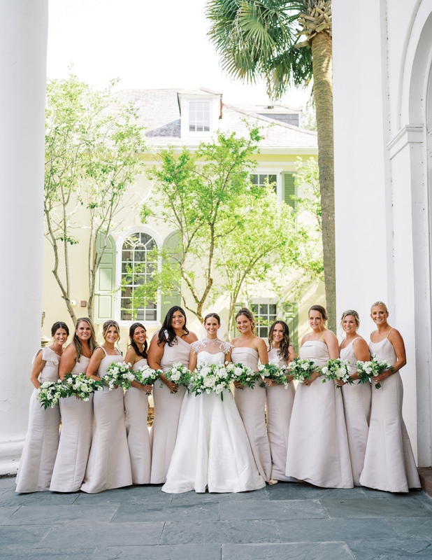 The 10 bridesmaids were resplendent in Amsale dresses.