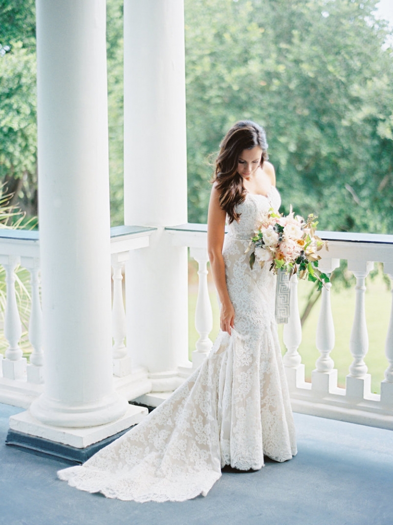 Bride&#039;s gown by Anne Barge, available in Charleston through White on Daniel Island. Hair and makeup by Ash and Co. Dress steaming by Cacky&#039;s Bride + Aid. Image by Ryan Ray Photography at Lowndes Grove Plantation.