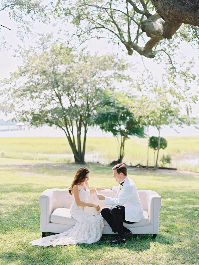 Bride&#039;s gown by Anne Barge, available in Charleston through White on Daniel Island. Groom&#039;s attire from Mens Wearhouse. Lounge furniture from Ooh! Events. Image by Ryan Ray Photography at Lowndes Grove Plantation.