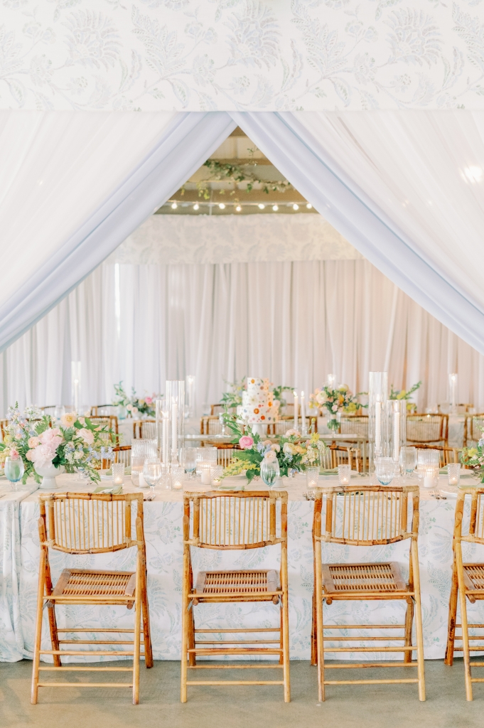 Bamboo ceremony chairs and airy florals by Festoon played nicely with the landscape.
