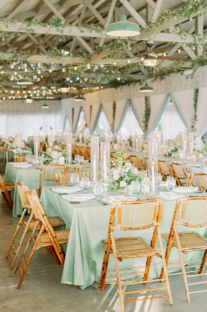 Sarah Lillie Designs transformed the space through elegant draping and graceful florals, while whimsical blues, greens, and natural browns reigned on the tablescapes.