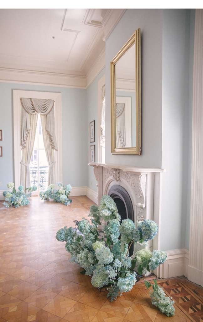 Florals by Vero Designs included a hyacinth flower crown, a dyed Stipa pennata grass bouquet, and delicately painted Limelight hydrangeas for décor.