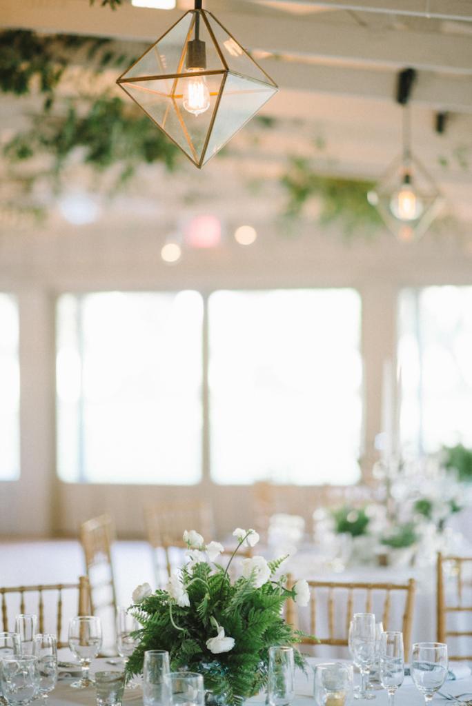 Photograph by Sean Money + Elizabeth Fay. Lighting by Technical Event Company. Florals by Tiger Lily Weddings.