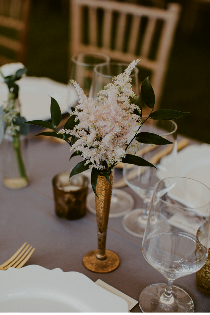 Brass Tacks - For a plated dinner with full settings, slender arrangements (like this astilbe posy) add beauty without overcrowding the tabletop.