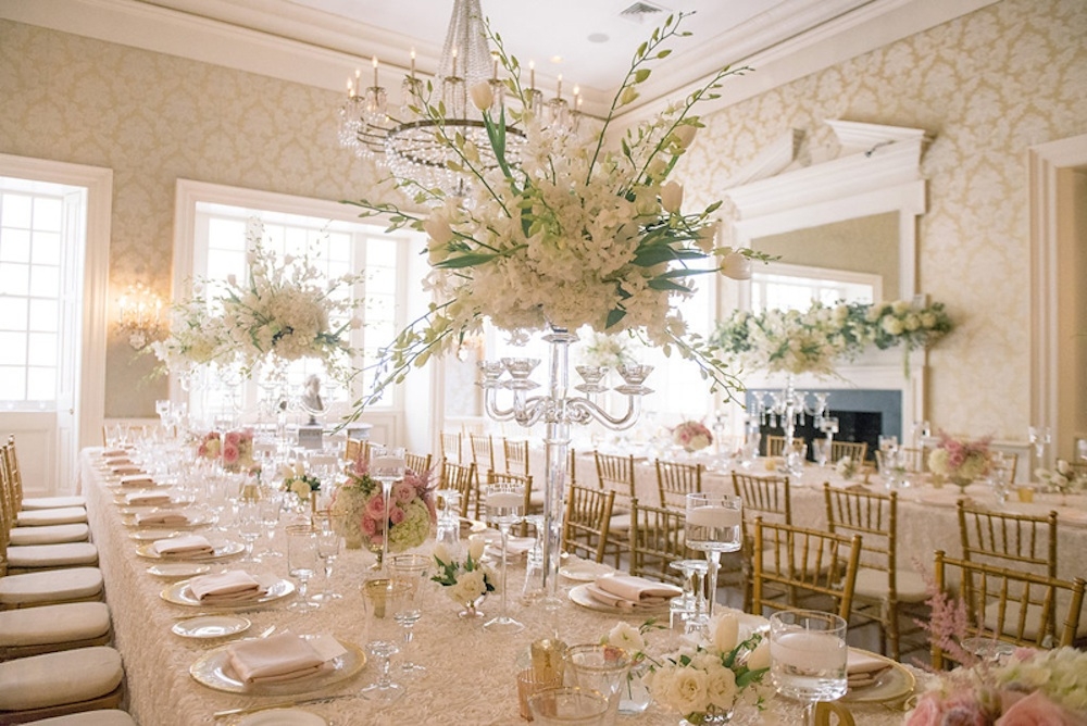 Wedding design by Sage Innovations. Florals by Branch Design Studio. Chairs from Snyder Events. Flatware, china, and chargers from EventWorks. Linens from I Do Linens. Image by Timwill Photography at McCrady&#039;s Restaurant.