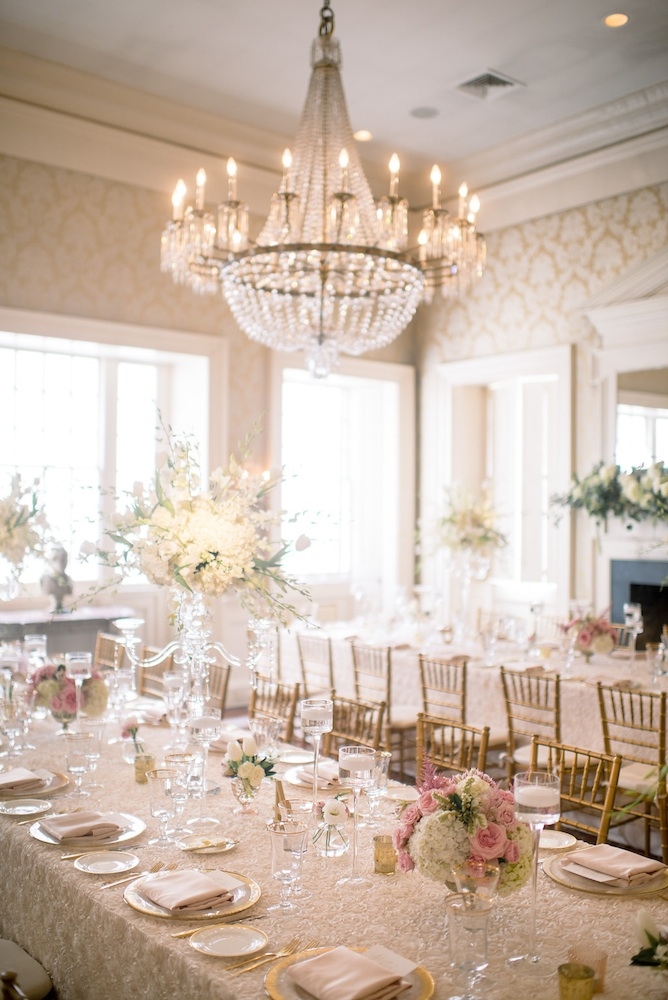 Wedding design by Sage Innovations. Florals by Branch Design Studio. Chairs from Snyder Events. Flatware, china, and chargers from EventWorks. Linens from I Do Linens. Image by Timwill Photography at McCrady&#039;s Restaurant.