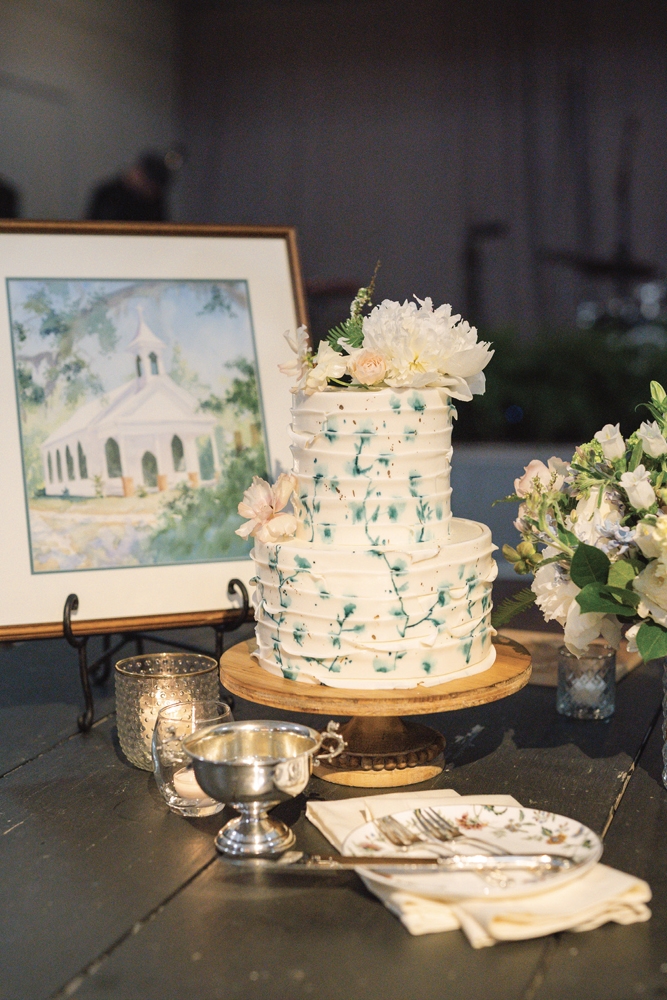 The cake (lemon with swiss meringue buttercream) echoed the blue and white chinoiserie motif that was carried through the dinner china, bridesmaid dresses, and the invitation suite.