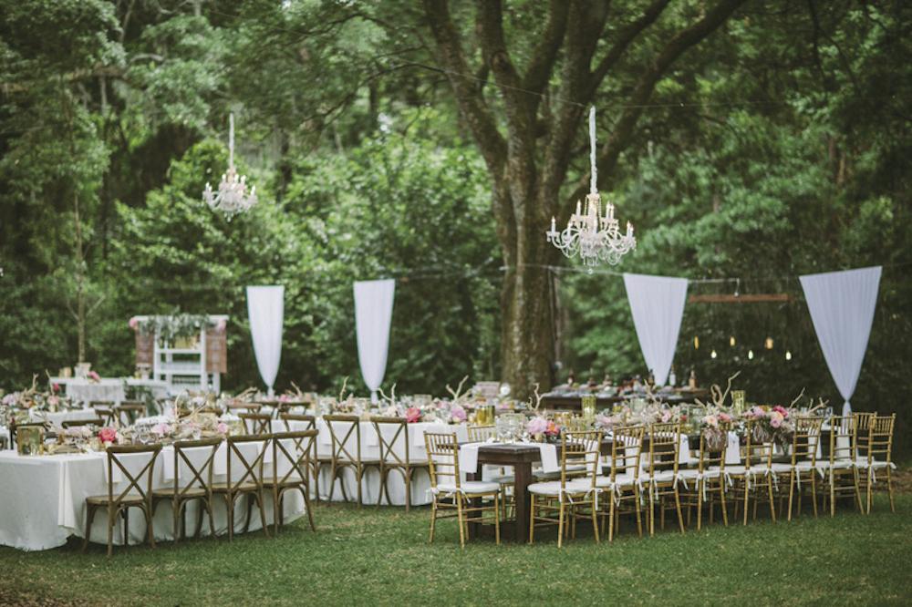 Wedding design and draping by Paper and Pine Co. Day-of coordination by Cafe Catering. Florals by Branch Design Studio. Chairs by from Snyder Events. Tables and linens from EventHaus. Photograph by Juliet Elizabeth at the Legare Waring House.