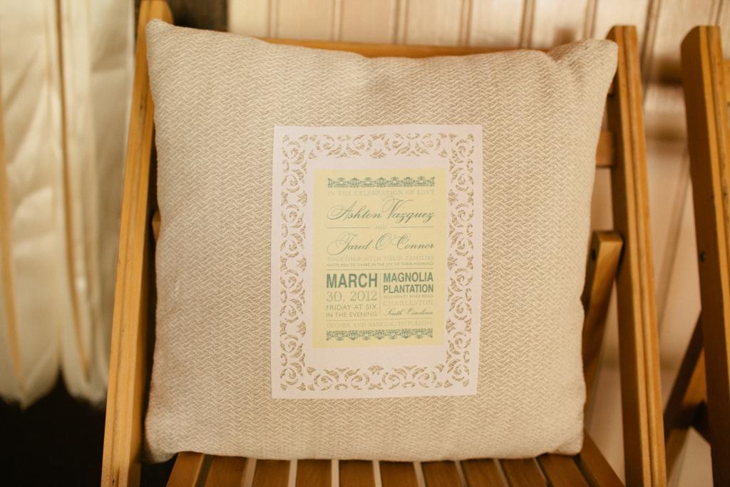 GOOD FEELING: Instead of adhering to a strict palette, Ashton played around with texture, resulting in elements like this woven pillow and the program with elegant cut-outs affixed to it.