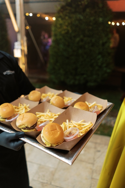 Late-night burgers and fries were a must: David is a “cheeseburger fanatic,” Taylor says, while she often socializes so much during events that she forgets to eat—necessitating a burger stop on the way home.