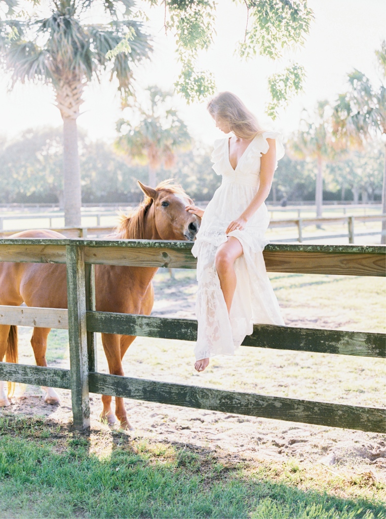 Rachel Zoe’s silk and cotton fil coupé tiered V-neck dress with ruffled sleeves from MODELBRIDE.  Morganite and  diamond rose gold ring from Gold Creations. Location: Seabrook Island Club Equestrian Center.  Photograph by Perry Vaile