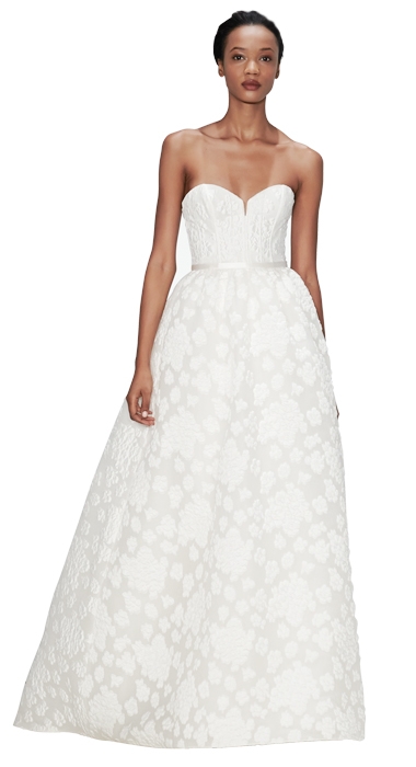 Gown: “Ingrid” by Amsale; Trends: corseted bodice and jacquard fabric; Shop: White on Daniel Island