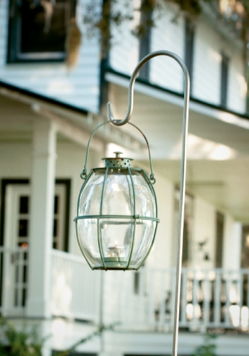 Lindsay borrowed lanterns from a friend, and hung them on shepherd hooks to create pathways across the lawn.