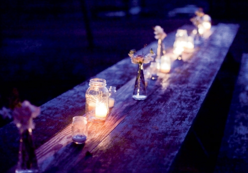 Light The Way: Mason jars with votives tossed a soft glow and protected the barn from open flames.