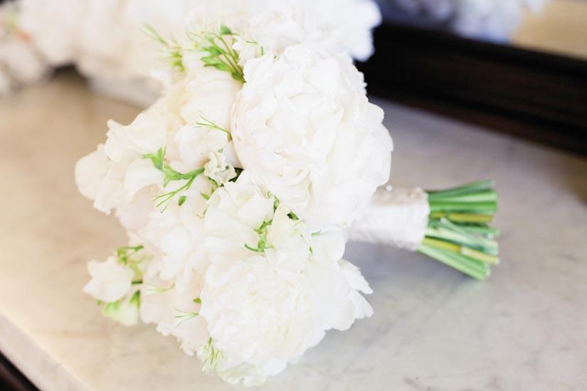 WHAT A BUNCH: “It was simple, classic, and appropriate,” Jessica says of her bouquet of white peonies, lisianthus, and sweet peas by Gathering Floral + Event Design’s Heather Barrie.