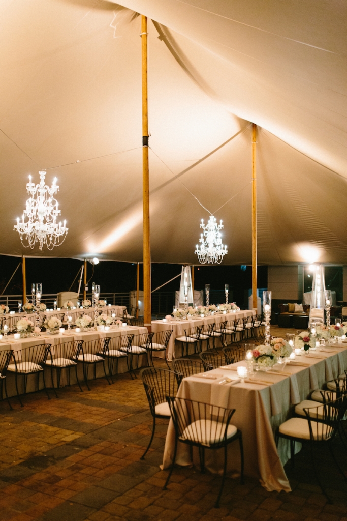 Wedding design by Fini Event Planning and Inventive Environments. Tent by Sperry Tents Southeast. Rentals from Snyder Events, EventWorks, and EventHaus. Lighting by Innovative Event Services. Image by Clay Austin Photography at Harborside East.
