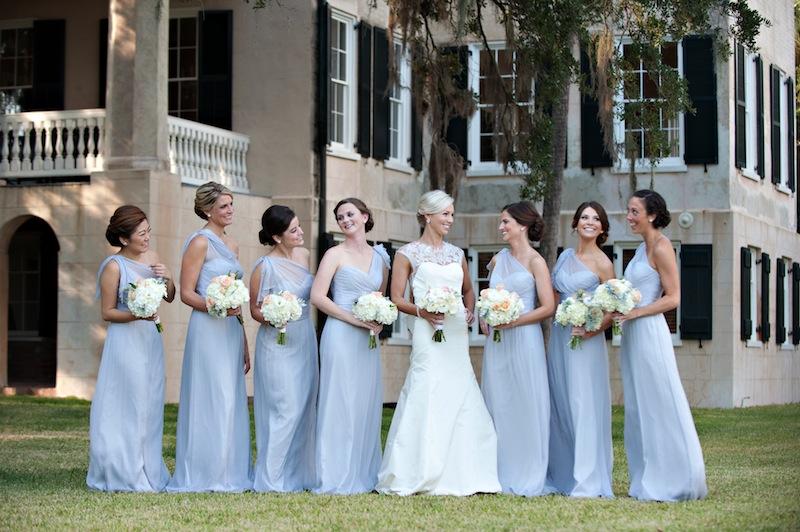 Bridal gown by Lela Rose. Bridesmaid’s attire by Amsale from Bella Bridesmaids. Hair by Bangs Salon. Florals by HB Stems. Bride’s jewelry by Cheryl King Couture. Bridesmaid jewelry by Kate Spade. Image by Kelli Boyd Photography. Private residence.