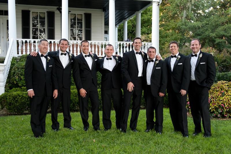 Groom and groomsmen’s attire by Jos. A. Bank. Boutonnieres by HB Stems. Image by Kelli Boyd Photography.
