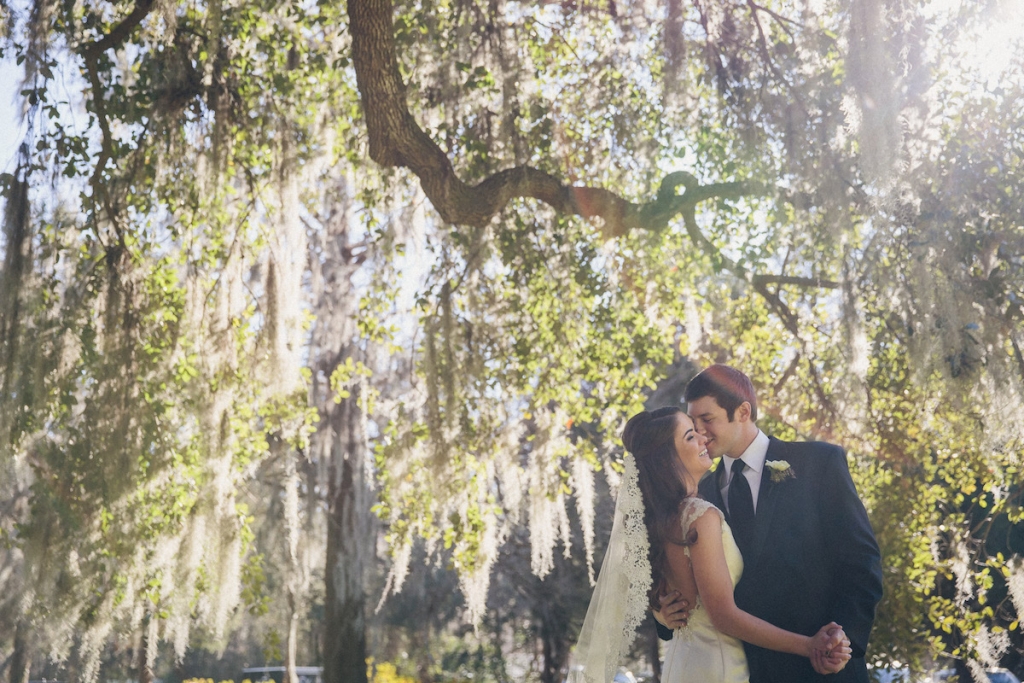 Bride’s gown from Bridal House of Charleston. Menswear from David’s Tuxedos. Image by Richard Bell Weddings at Magnolia Plantation &amp; Gardens.