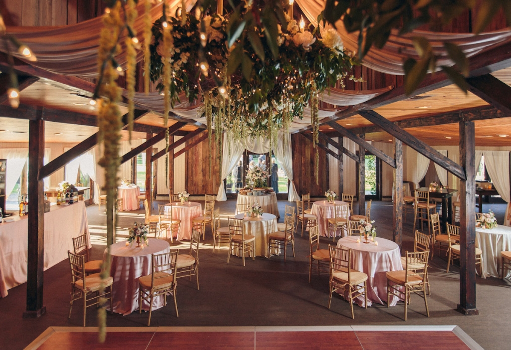 Wedding design and reception florals by Engaging Events. Image by Richard Bell Weddings at Magnolia Plantation &amp; Gardens.