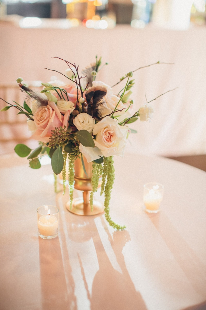 Reception florals by Engaging Events. Image by Richard Bell Weddings at Magnolia Plantation &amp; Gardens.