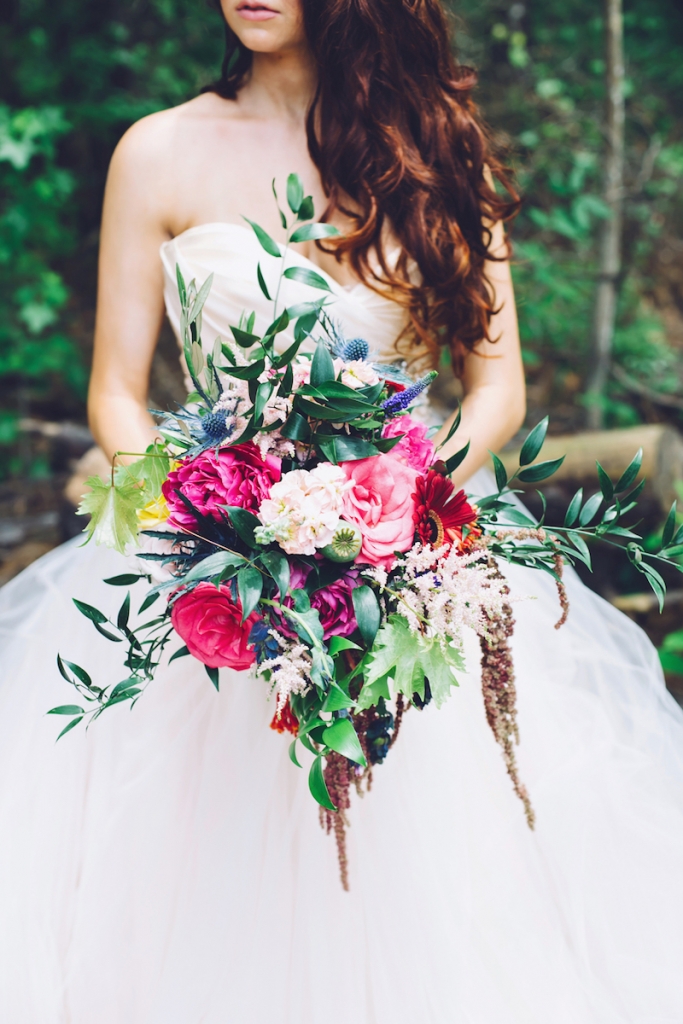 Bridal attire by Lazaro from Gown Boutique of Charleston. Bouquet by Anna Bella Florals. Image by Monika Gauthier Photography &amp; Design at The Stables at Boals Farm.