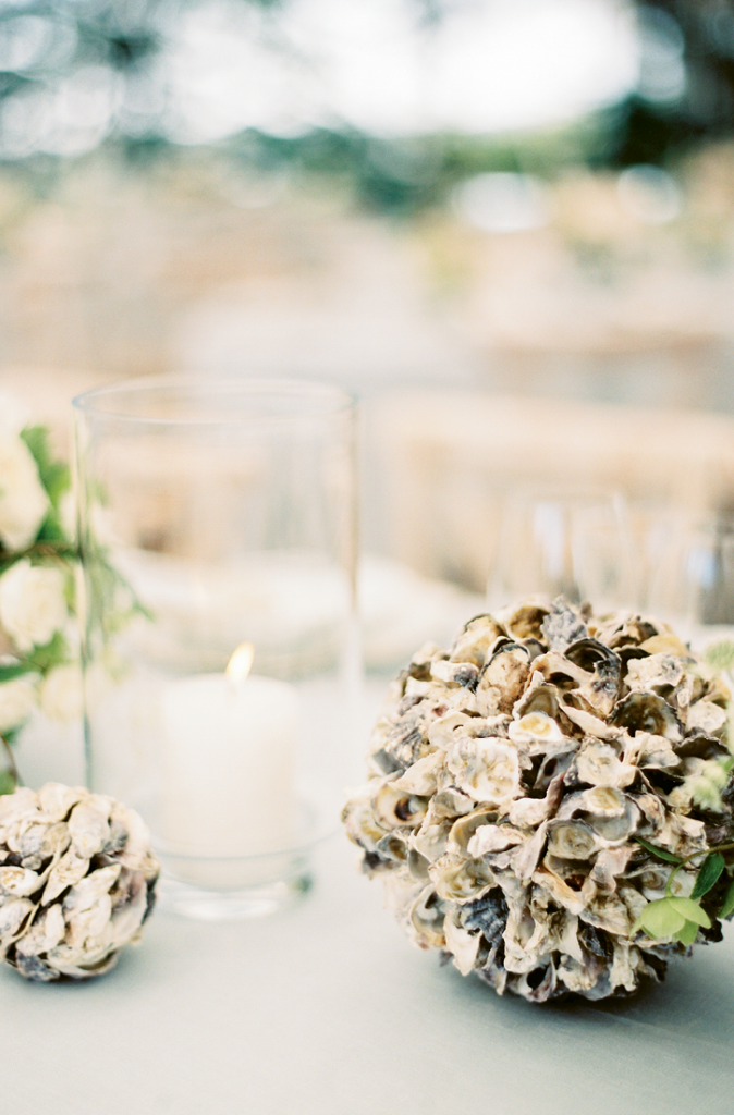 Oysters were a favorite element on the bride’s inspiration boards, so globes like this dotted the setting