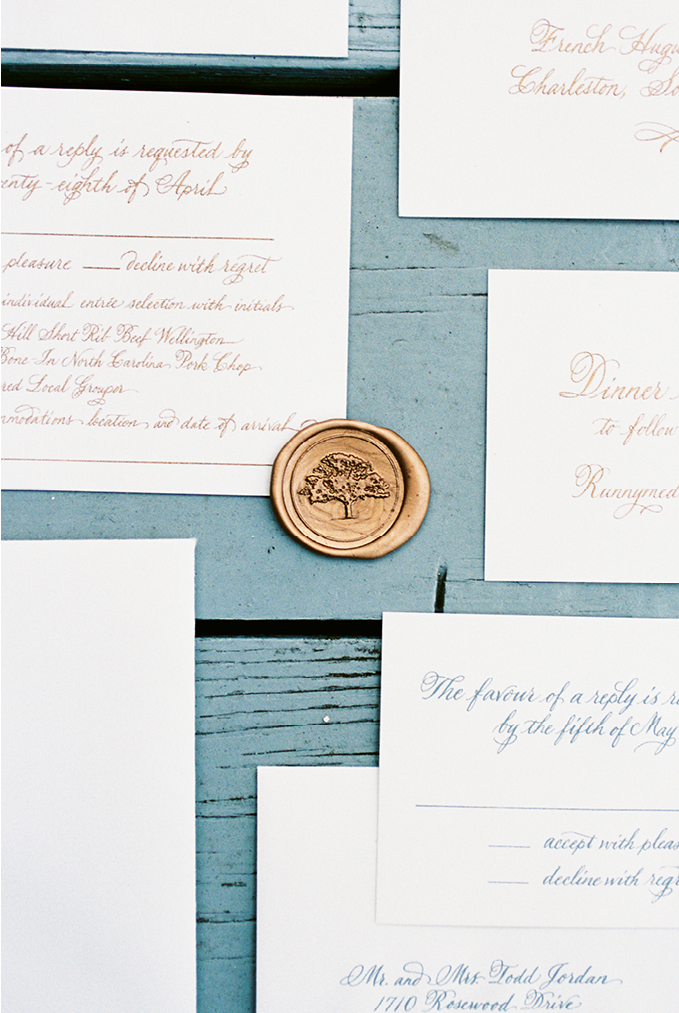 The stationery suite’s wax seal and embossed oak tree not only represents a Lowcountry icon, but also a favorite tree that shaded a bench where the couple often took in the sunset during their dating years.