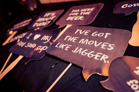 SAY WHAT? Chinyere crafted playful props for the photo booth, provided by Charleston Party Booth.
