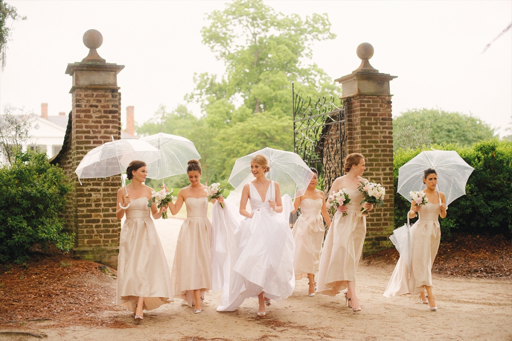 Transparent umbrellas kept Elisa and her maids dry—and oh-so fashionable.     &lt;i&gt;Image by Evan Laettner Photography&lt;/i&gt;