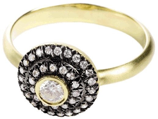 OPPOSITES ATTRACT: 18K  yellow gold and rhodium-plated ring with .3 ct. diamond and accent diamonds (.2 total ct.) Croghan’s Jewel Box, $1,520