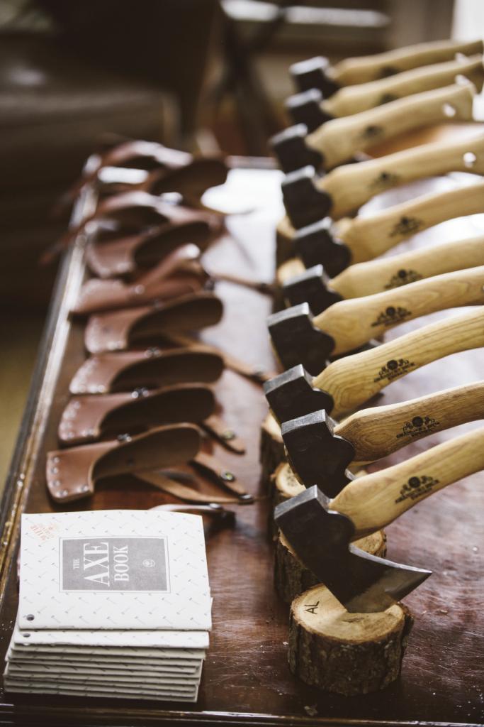 Kent gifted his  groomsmen hatchets; his father burned each of their names into the handles. Image by amelia + dan photography.