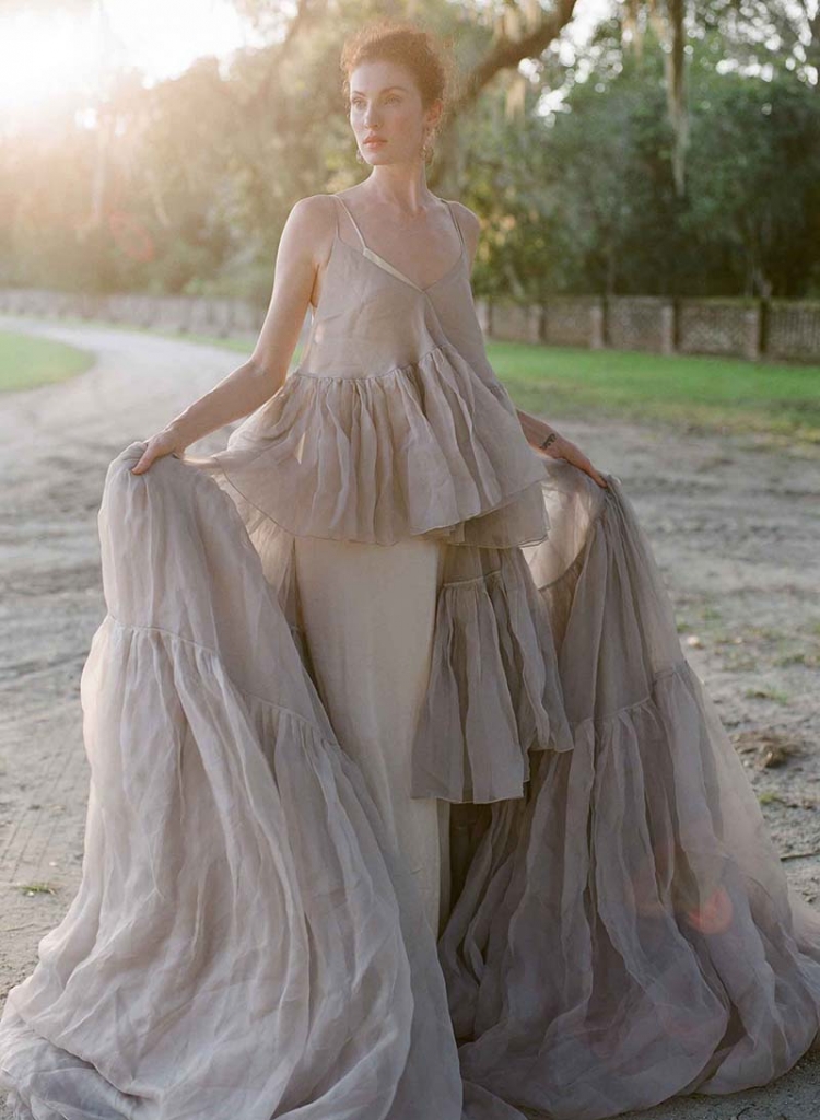 Carol Hannah’s “Euphorbia” tiered silk organza ruffled overdress in wisteria and silk charmeuse “Petal” slip from Southern  Protocol Bridal  Boutique. Diamond earrings from Diamonds Direct. Gabriel &amp; Co.’s diamond ring from Polly’s Fine Jewelry.   &lt;i&gt;Photograph by Corbin Gurkin&lt;/i&gt;