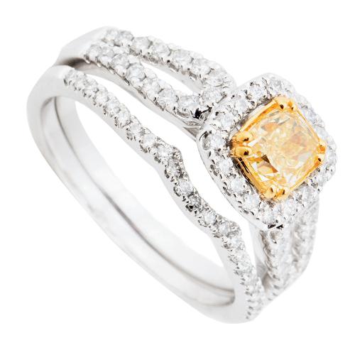 14K white gold ring and band set with .75 ct. yellow diamond center and accent diamonds (.45 total cts.) from REEDS Jewelers; $5,250